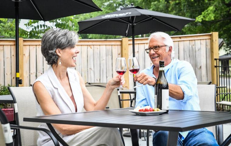 couple drinking wine on patio